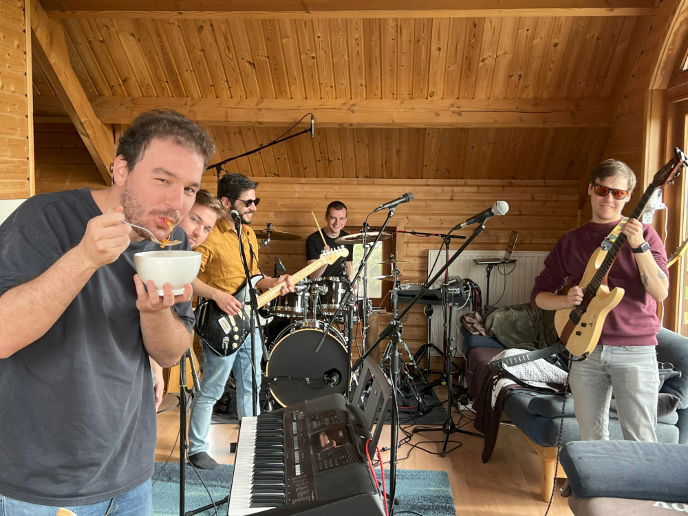 The band posing with their instruments